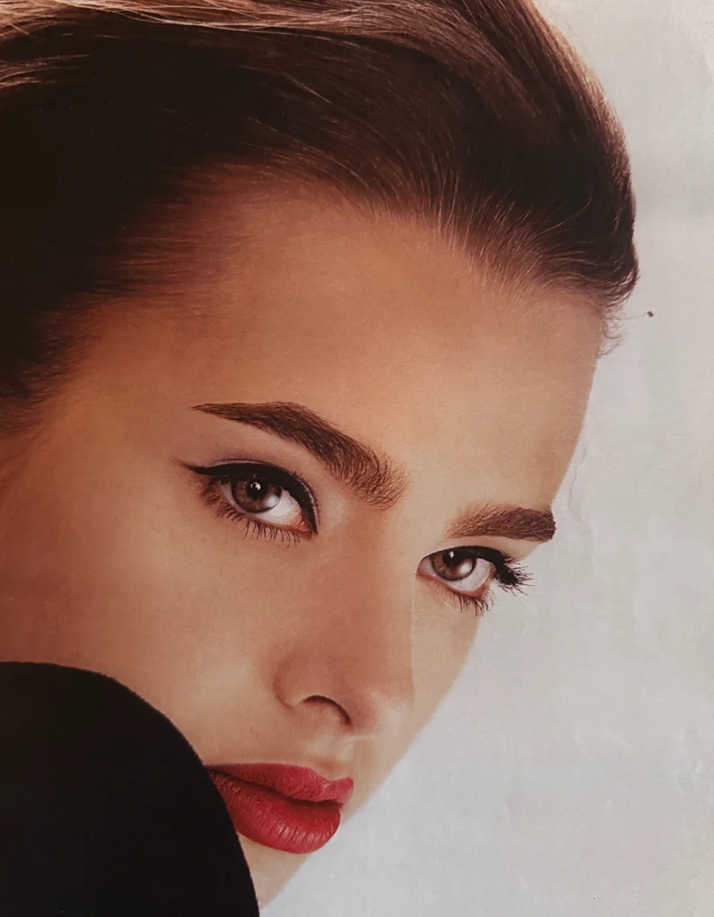 May Gil model pictures - close-up of May Gil's face with red lipstick